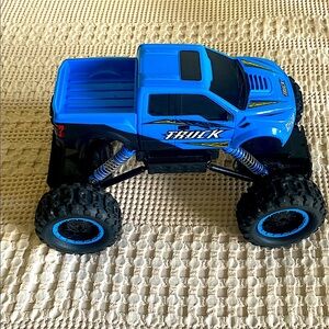 Amazon Blue and Black Monster Truck Toy